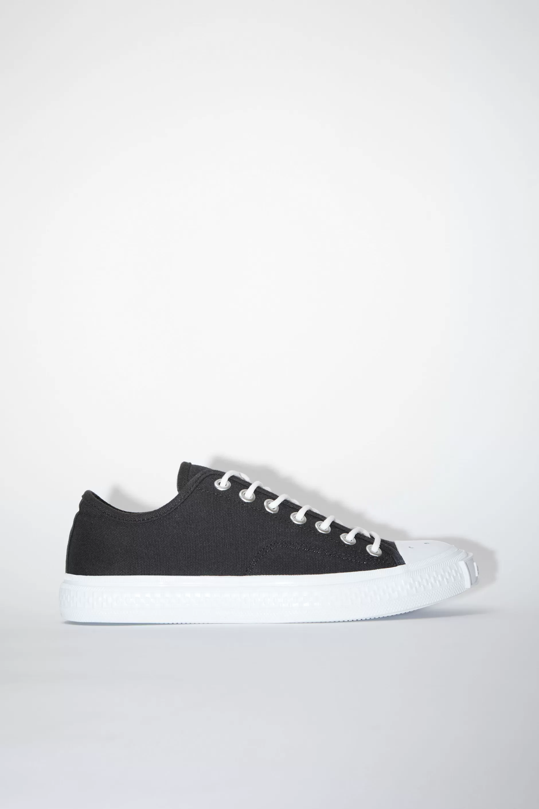 Acne Studios Niedrige Sneakers Schwarz/Gebrochenes Weis Fashion